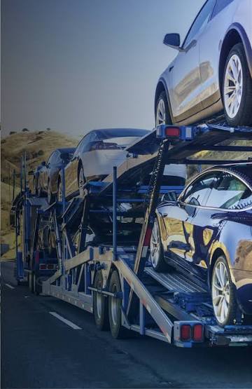 Aldryx Transport Group multi-car transporter carrying vehicles across Europe
